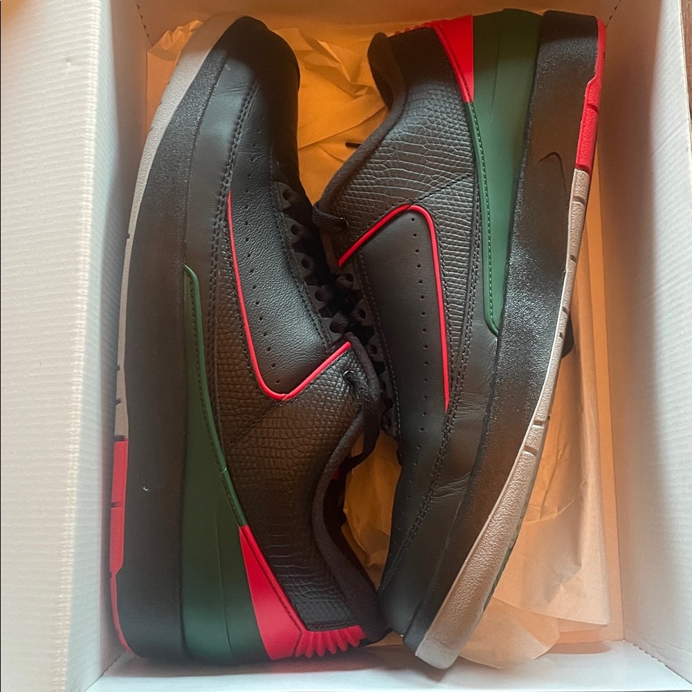 Jordan Black and Red Sneakers with Green Accents